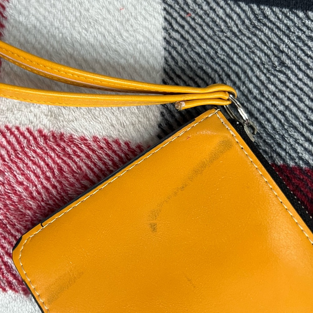 Bright and cheery yellow leather wallet.